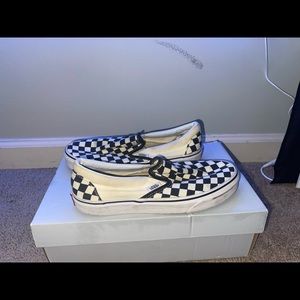 WORN BLACK AND WHITE CHECKERBOARD VANS